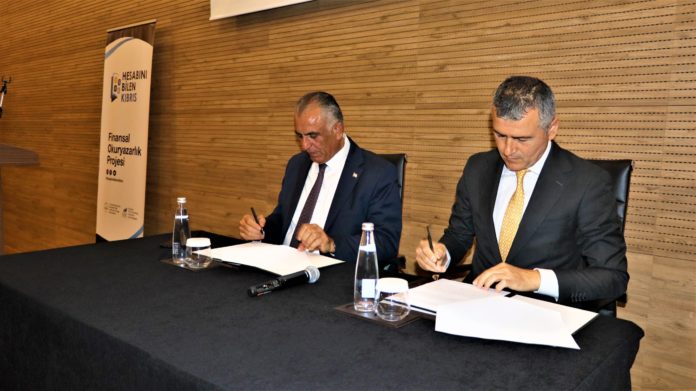 Milli Eğitim Bakanı Nazım Çavuşoğlu ile Kıbrıs Türk Bankalar Birliği Başkanı Olgun Önal’
